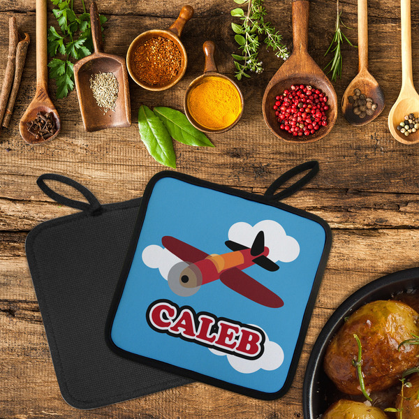 Airplane Neoprene Pot Holder - Set of 2  LIFESTYLE (Flatlay)