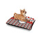 Red & Black Dots & Stripes Outdoor Dog Beds - Small - IN CONTEXT