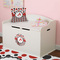 Red & Black Dots & Stripes Round Wall Decal on Toy Chest