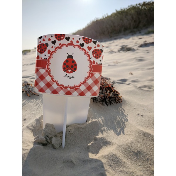 Ladybugs & Gingham Beach Spiker white on beach with sand