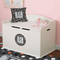 Gray Dots Round Wall Decal on Toy Chest