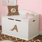 Giraffe Print Wall Letter Decal Small on Toy Chest