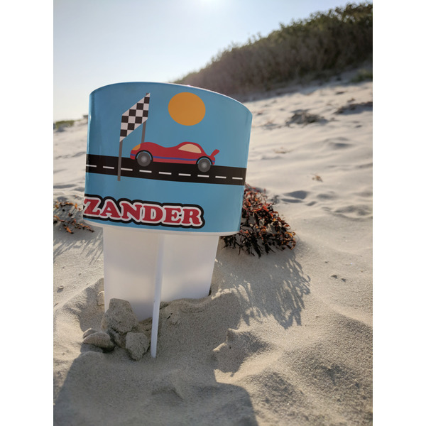 Race Car Beach Spiker white on beach with sand