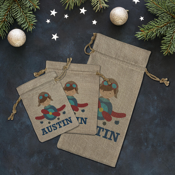 Airplane Theme Burlap Gift Bags - LIFESTYLE (Flat lay)