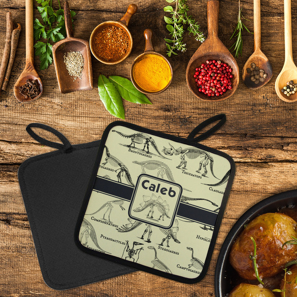 Dinosaur Skeletons Neoprene Pot Holder - Set of 2  LIFESTYLE (Flatlay)