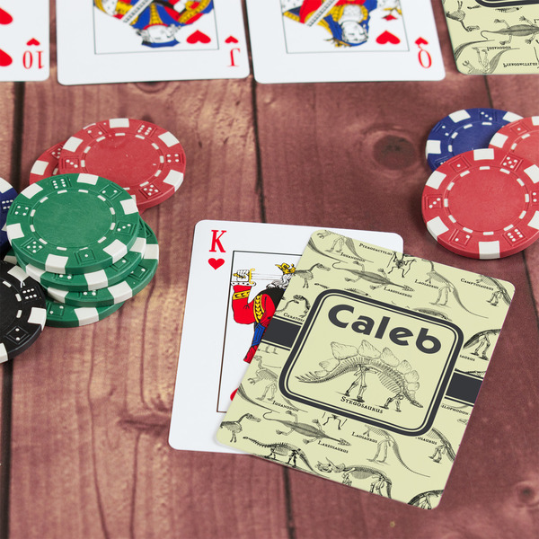 Dinosaur Skeletons On Table with Poker Chips