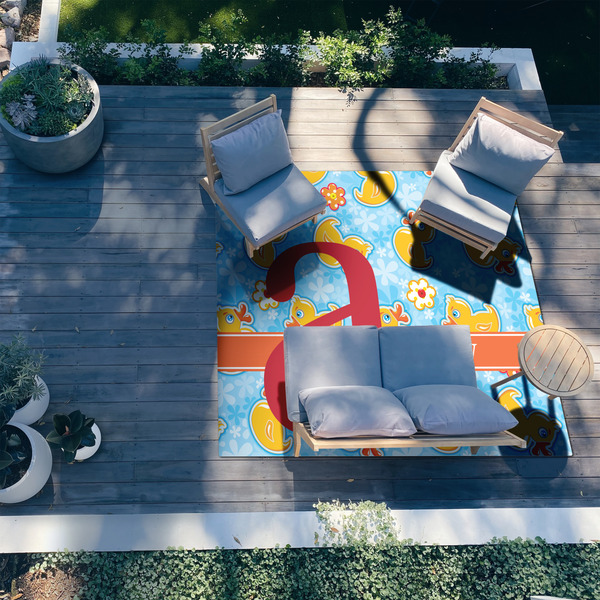Rubber Duckies & Flowers 8'x10' Patio Rug - In context