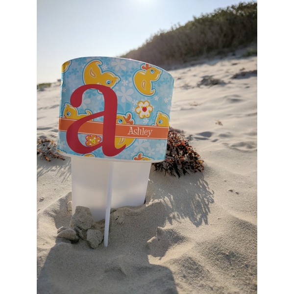 Rubber Duckies & Flowers Beach Spiker white on beach with sand