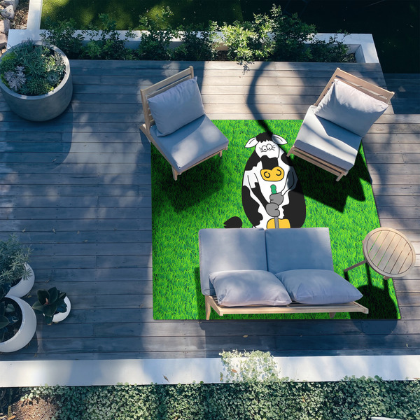 Cow Golfer 8'x10' Patio Rug - In context
