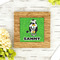 Cow Golfer Bamboo Trivet with 6" Tile - LIFESTYLE