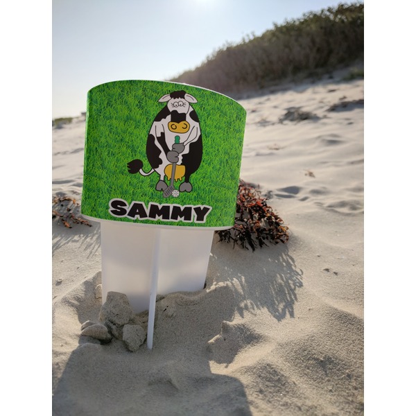 Cow Golfer Beach Spiker white on beach with sand