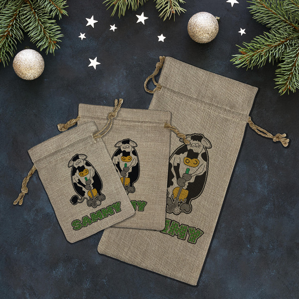 Cow Golfer Burlap Gift Bags - LIFESTYLE (Flat lay)