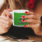 Cow Golfer Espresso Cup - 6oz (Double Shot) LIFESTYLE (Woman hands cropped)