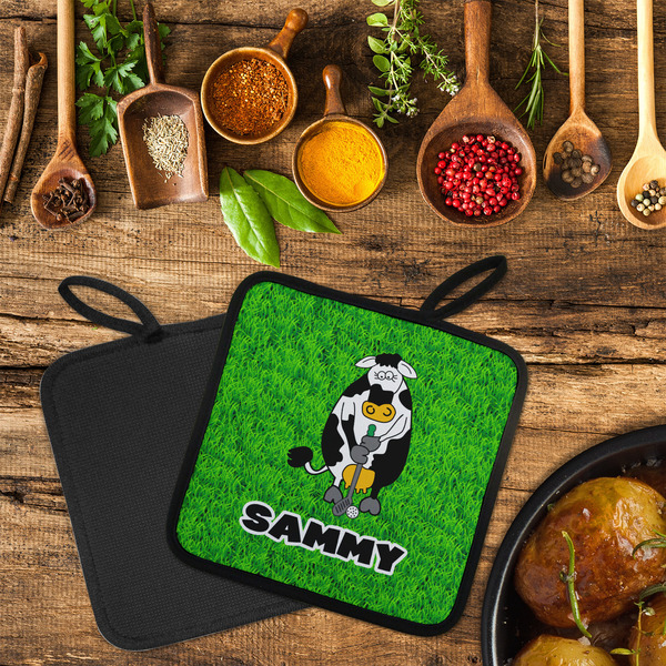 Cow Golfer Neoprene Pot Holder - Set of 2  LIFESTYLE (Flatlay)