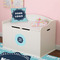 Logo & Company Name Round Wall Decal on Toy Chest