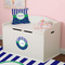 Alligators & Stripes Round Wall Decal on Toy Chest