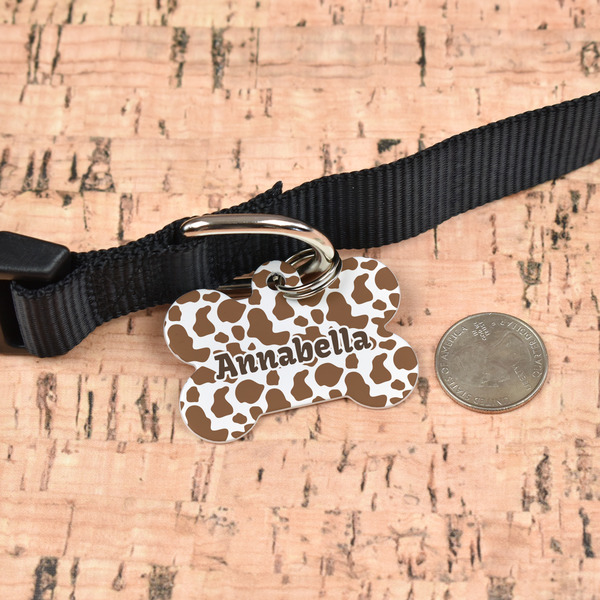 Cow Print Bone Shaped Dog ID Tag - Large - In Context