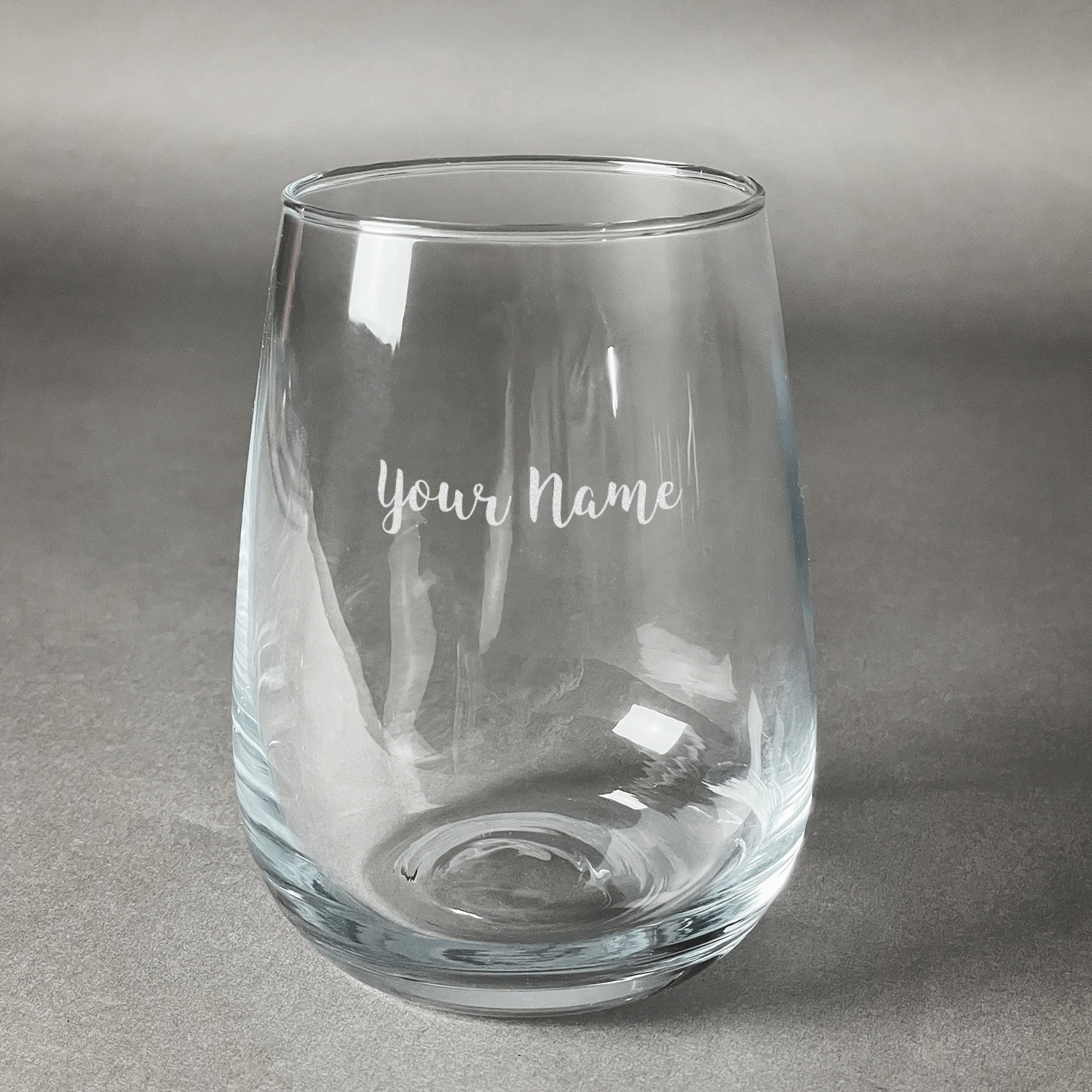 https://www.youcustomizeit.com/common/MAKE/837464/Script-Name-Stemless-Wine-Glass-Front-Approval.jpg?lm=1690555862