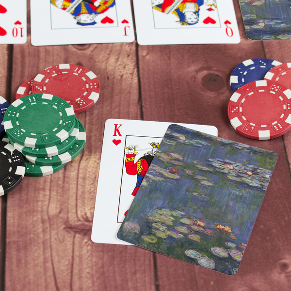 Water Lilies by Claude Monet On Table with Poker Chips